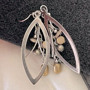 Sterling silver dangle earrings.